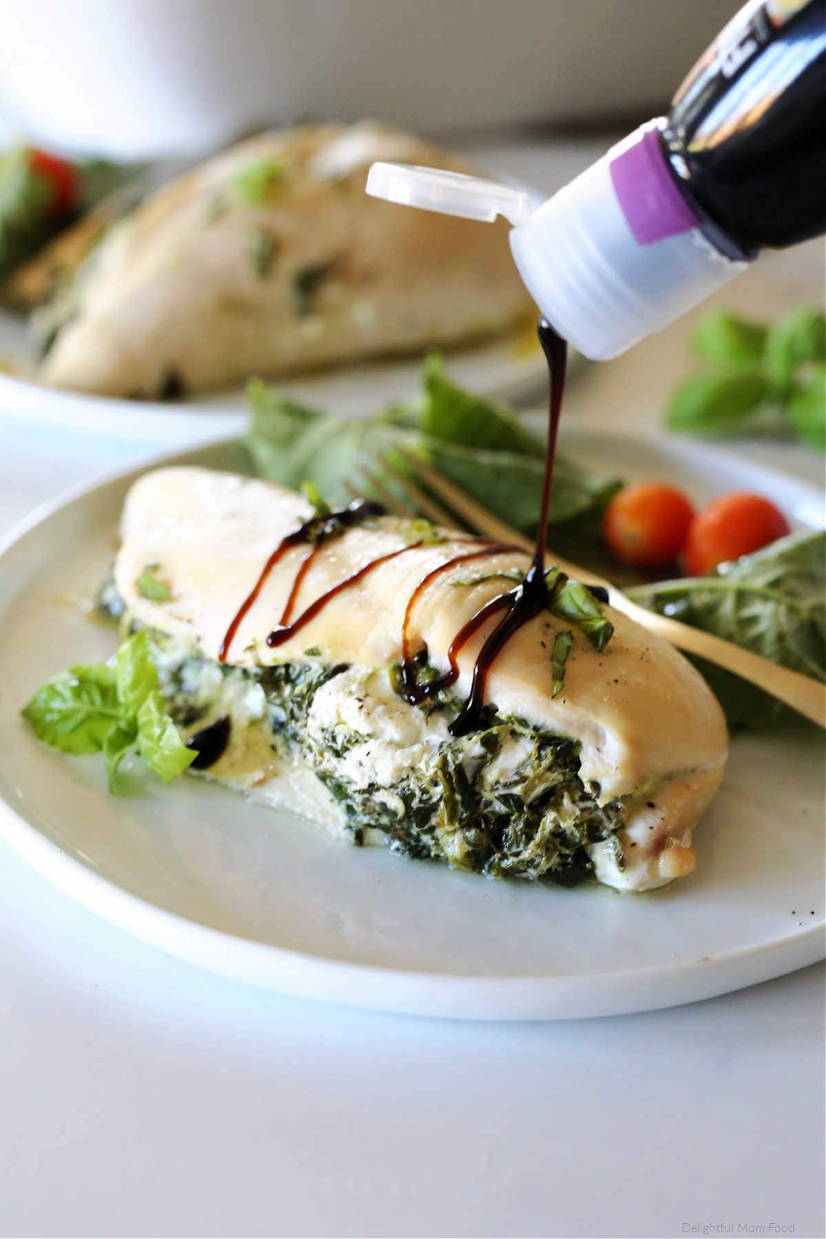 balsamic reduction drizzled over stuffed chicken