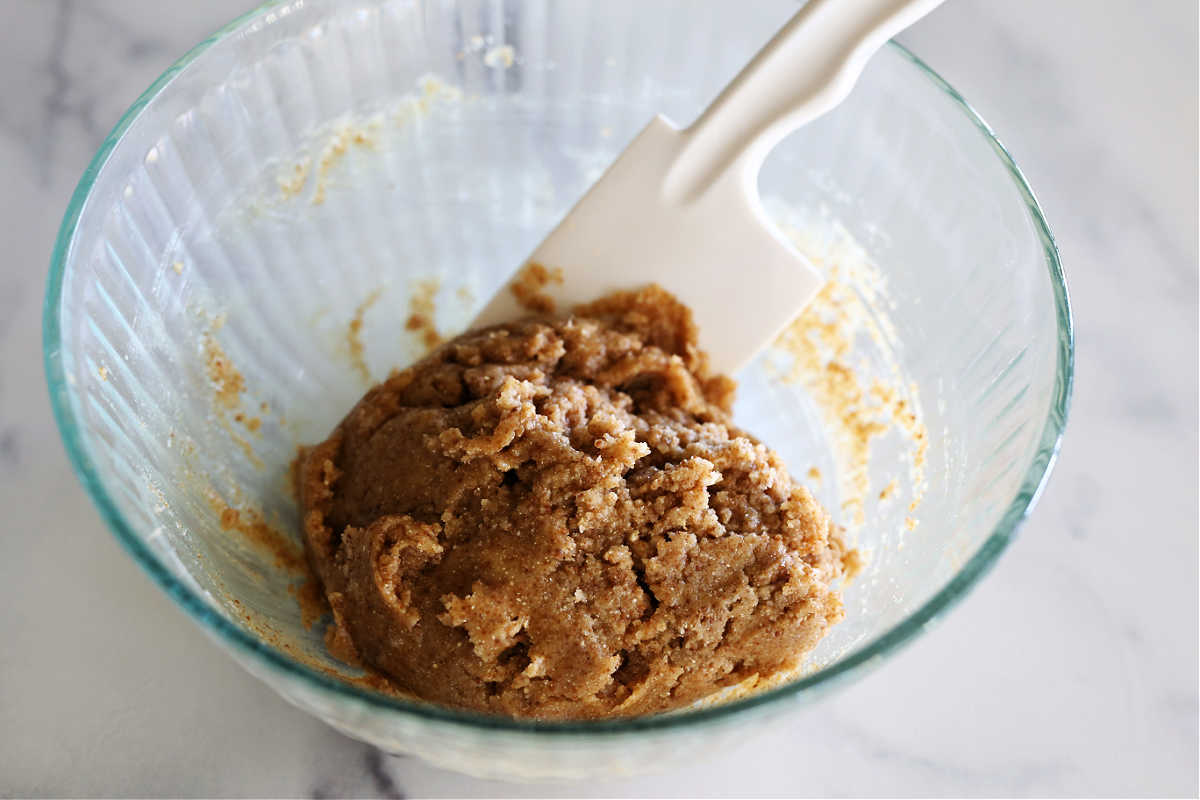 aip snickerdoodle cookie dough in a bowl with a spatula