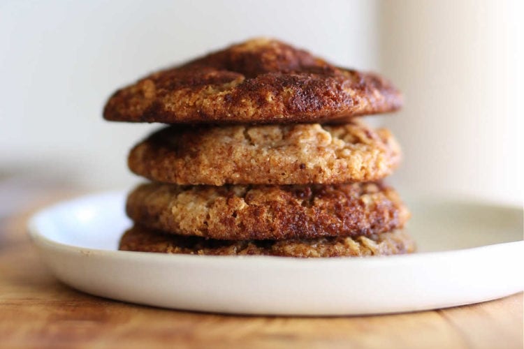 stack of AIP cookies and a glass of dairy-free milk
