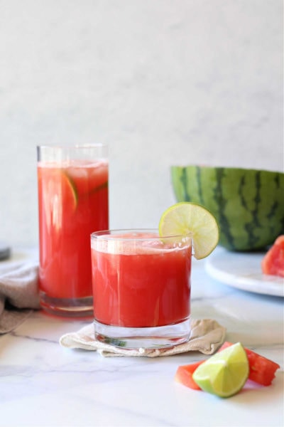 Watermelon Juice in two glasses with lime
