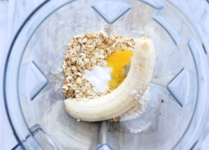 banana oats eggs baking powder in a blender