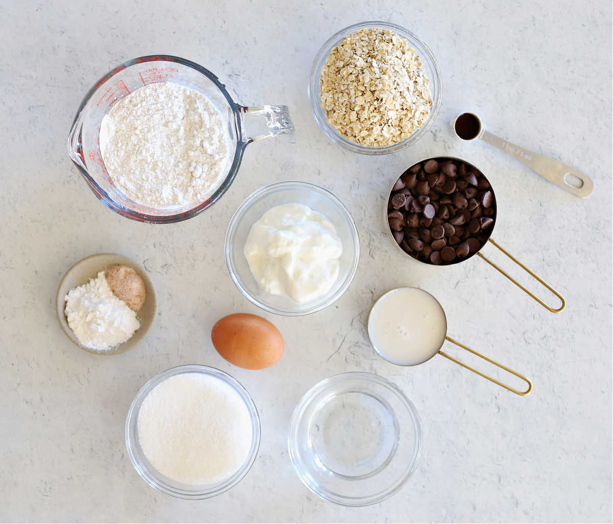 Ingredients for healthy muffins made with oats and chocolate chips