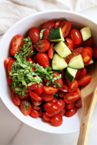 cucumber tomato salad in a bowl