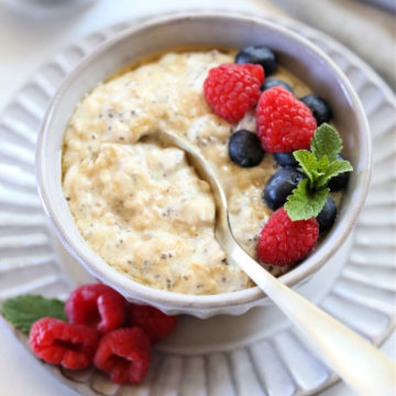 spoon scooping oatmeal made with protein powder and yogurt