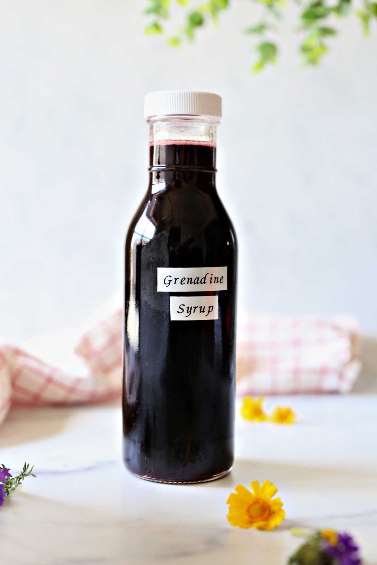 grenadine syrup in a glass bottle for mocktails and cocktails