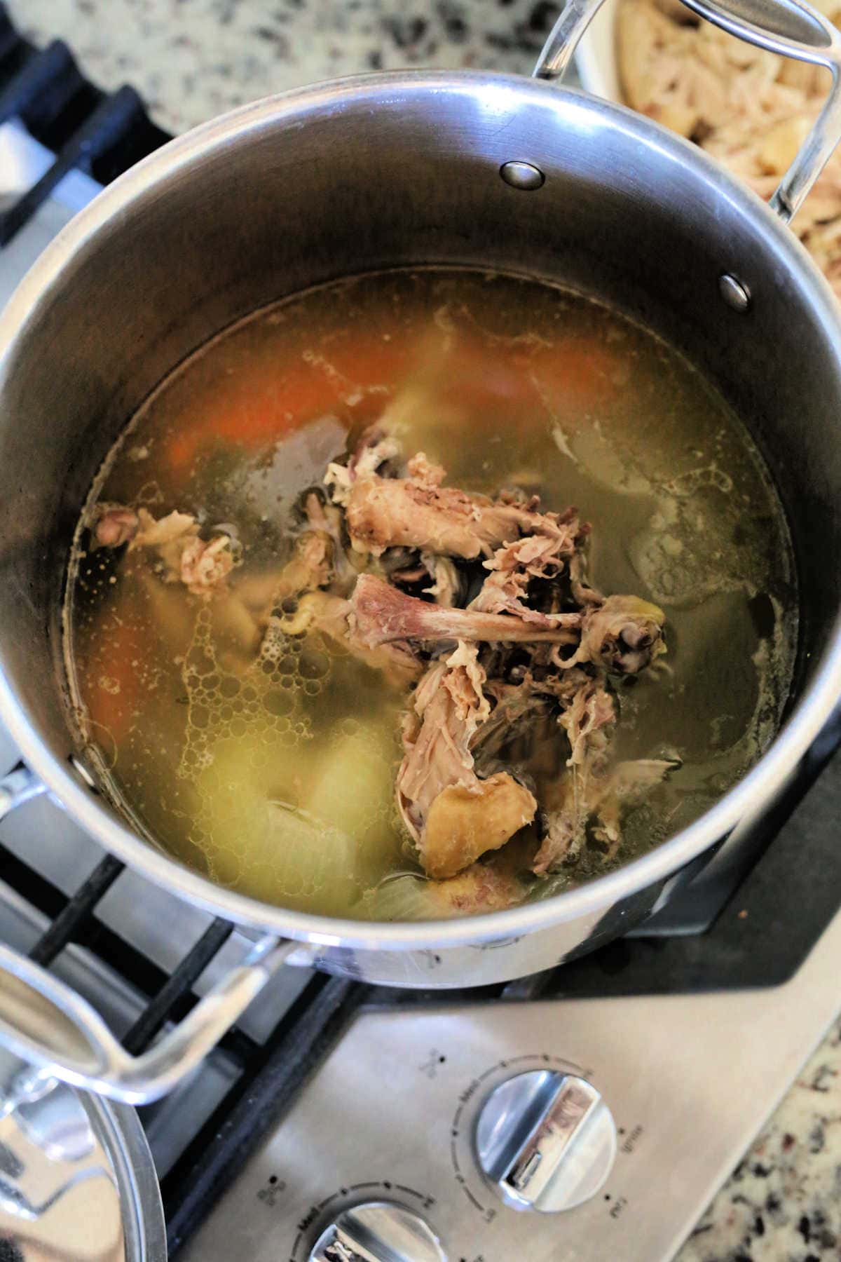 chicken bones without the meat and vegetables in water for homemade bone broth