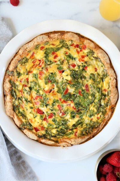 gluten-free quiche made with spinach fire roasted red peppers and goat cheese