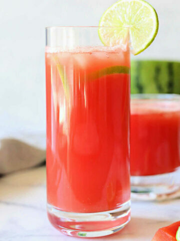 watermelon juice recipe in a glass with fresh lime slice