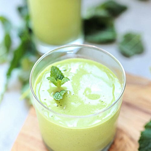 kale banana smoothies with mint in glasses