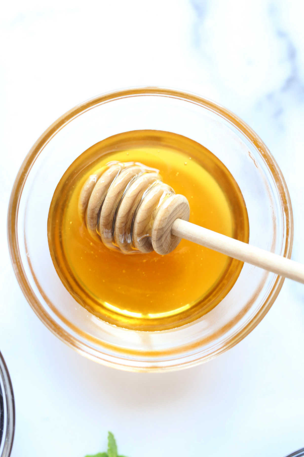 Honey In A Bowl With A Honey Scoop