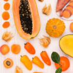 Orange Fruits and Orange Color Produce on a White Background
