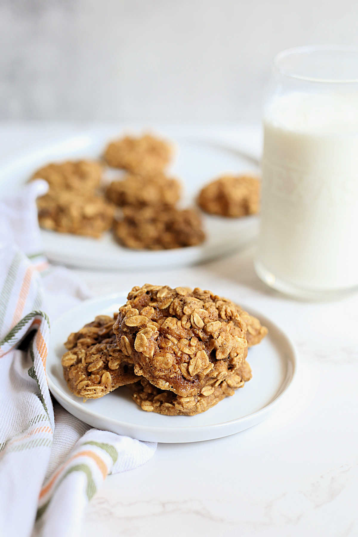 Healthy Chewy Peanut Butter Oatmeal Cookie Recipe On A Plate With A Glass Of Milk And Towel