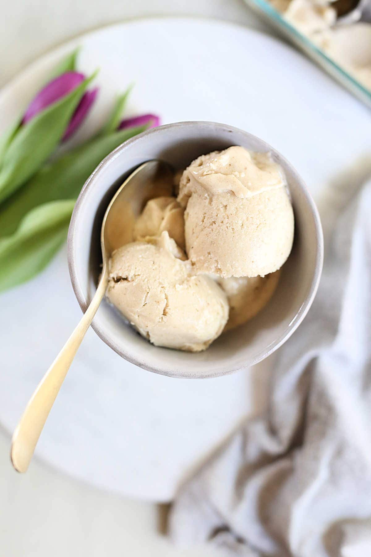 Healthy Banana Ice Cream Recipe in a Bowl with a Gold Spoon