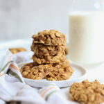 Peanut Butter Oatmeal Cookies Recipe PB2 Cookies Stacked on a Plate with a Glass of Milk