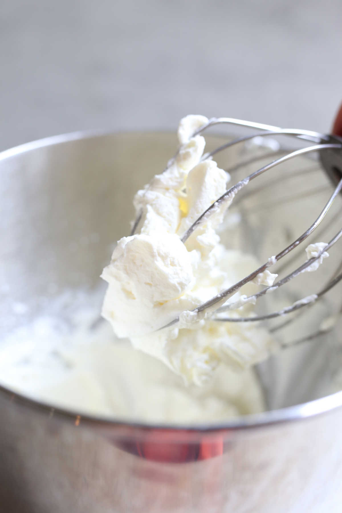 Keto Sugar-Free Whipped Cream on an Electric Mixer Whisk