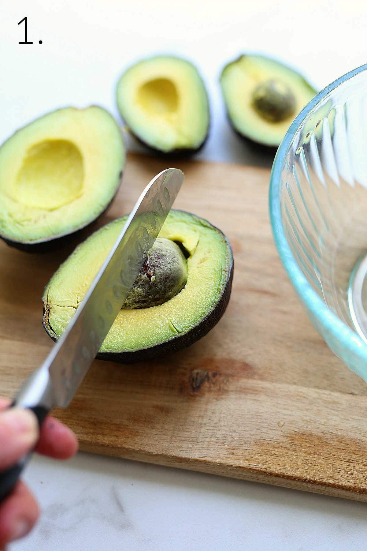 Slicing Avocado with a Knife and Removing the Seed.
