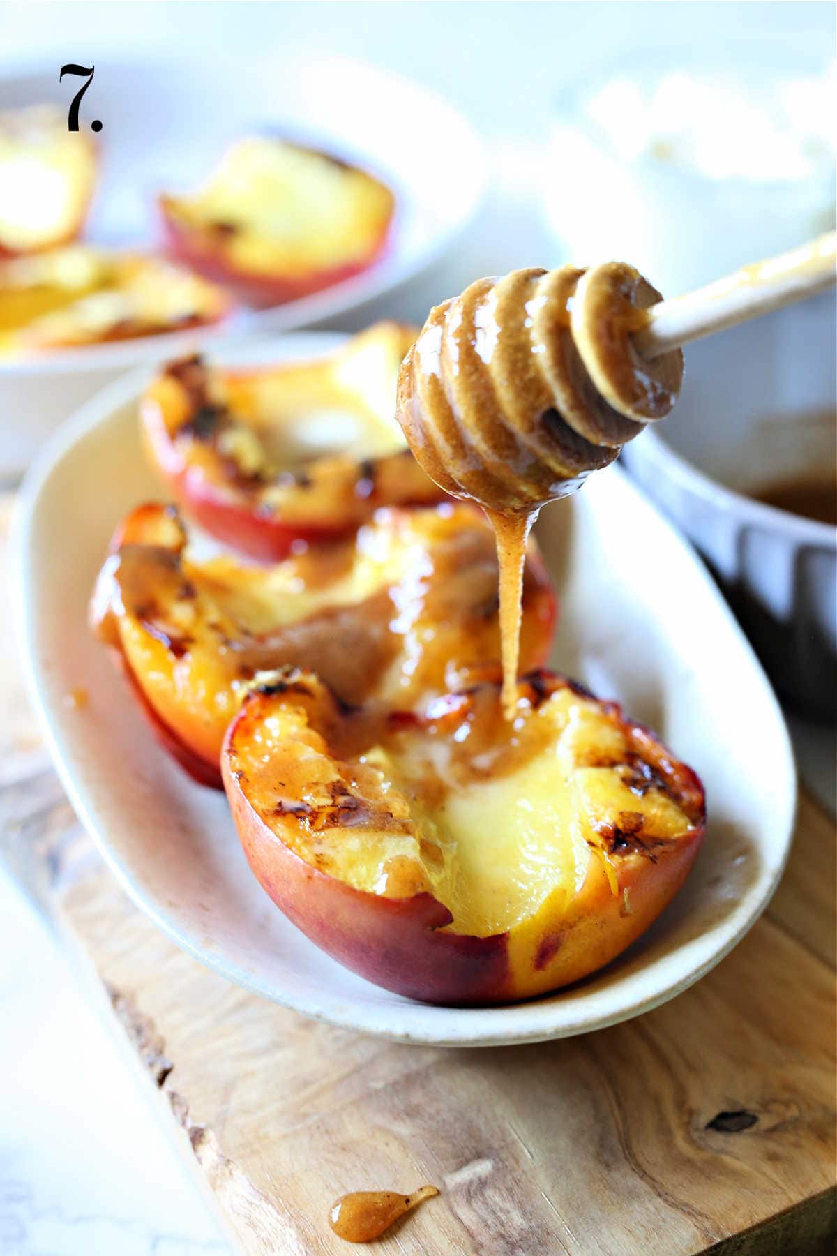 Grilled peaches stuffed with honey drizzle and butter.