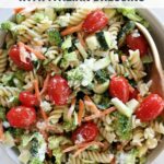 Healthy cold pasta salad with Italian dressing recipe in a salad bowl.