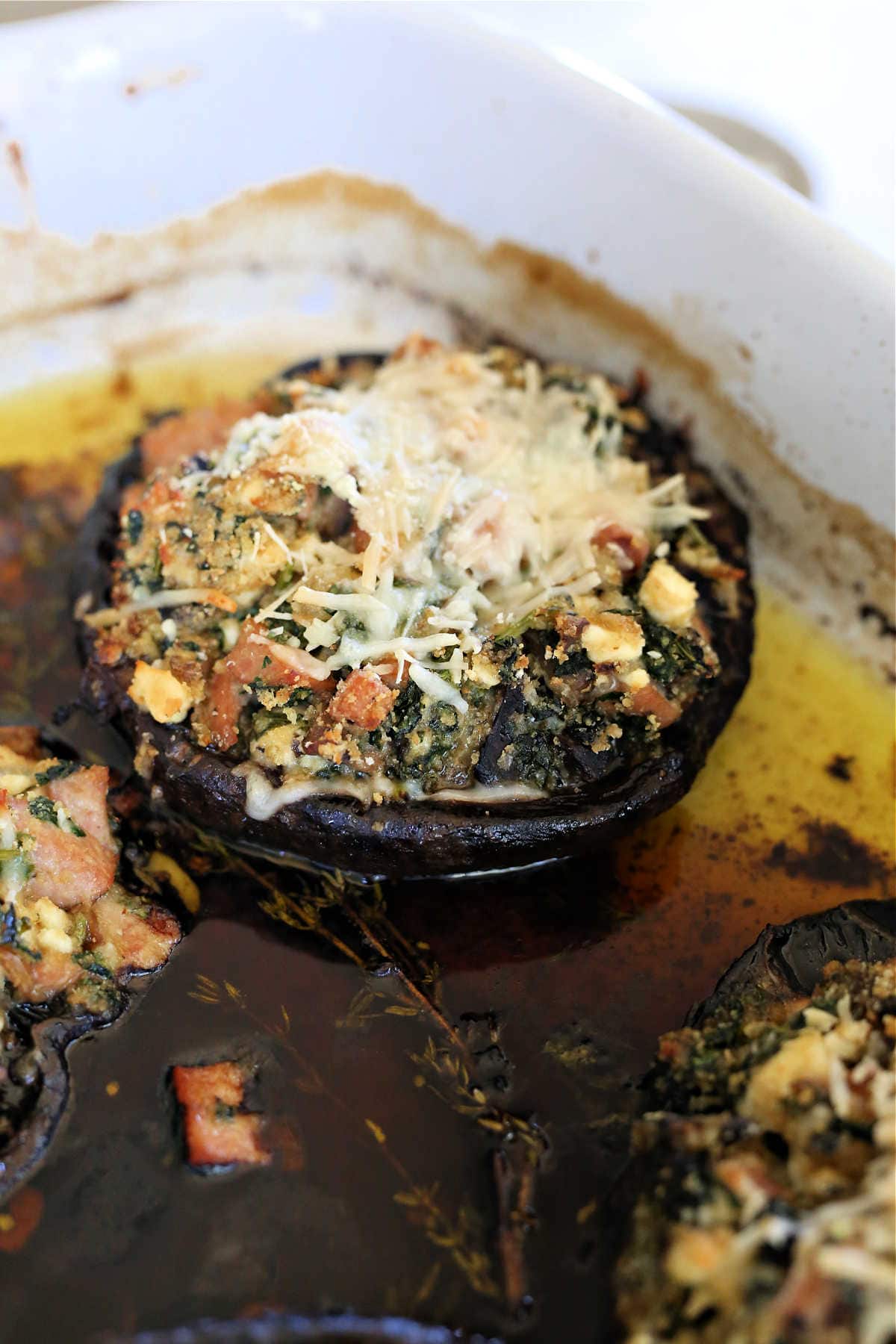 Portobello mushrooms marinated and stuffed with chicken sausage spinach and cheese.