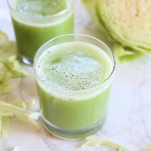Cabbage juice recipe in a glass.