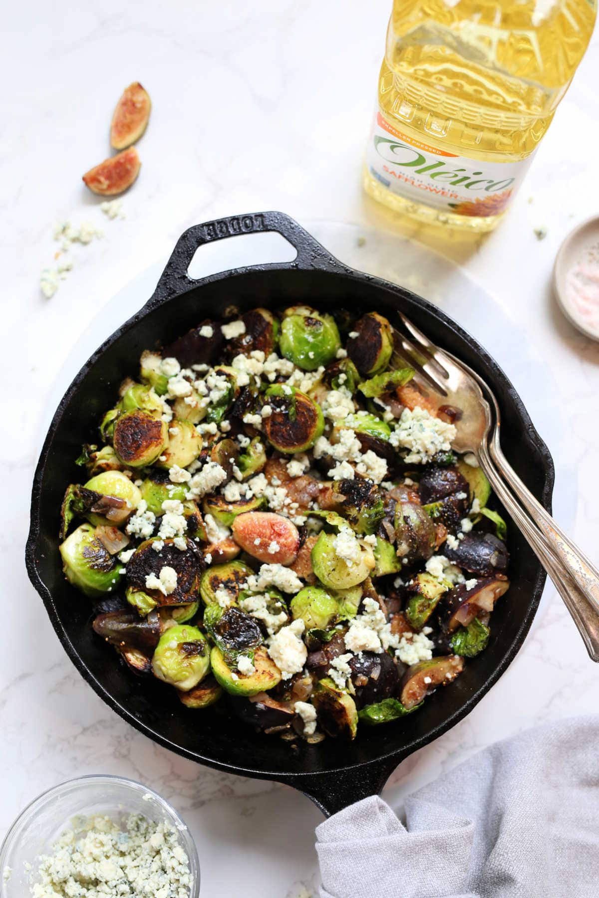 Easy fried brussels sprouts in a cast iron skillet.