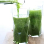 Juiced recipe pouring from a blender to a glass.