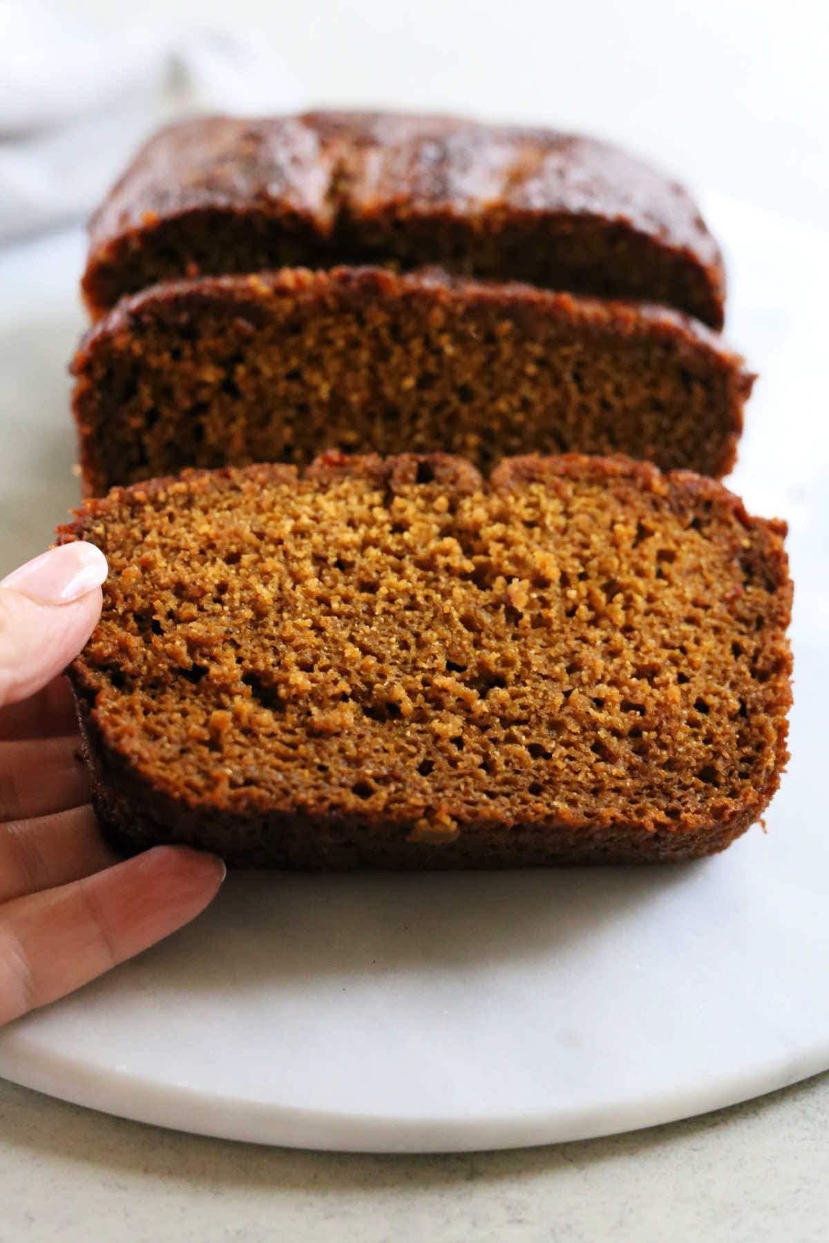 Moist slice of easy pumpkin bread made paleo without almond flour.