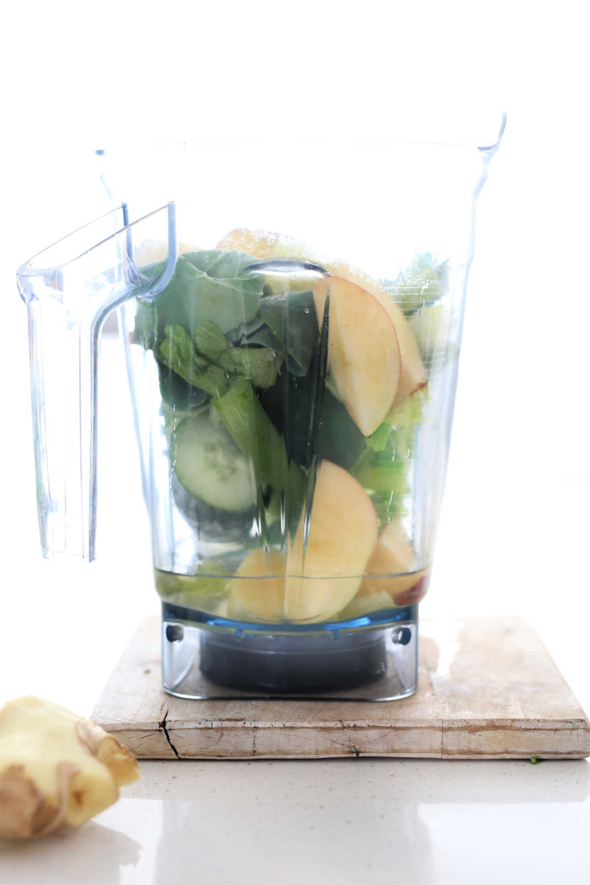 Fruits and vegetables in a blender to juice.