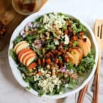Kale salad with apples blue cheese walnuts and sweet potatoes.