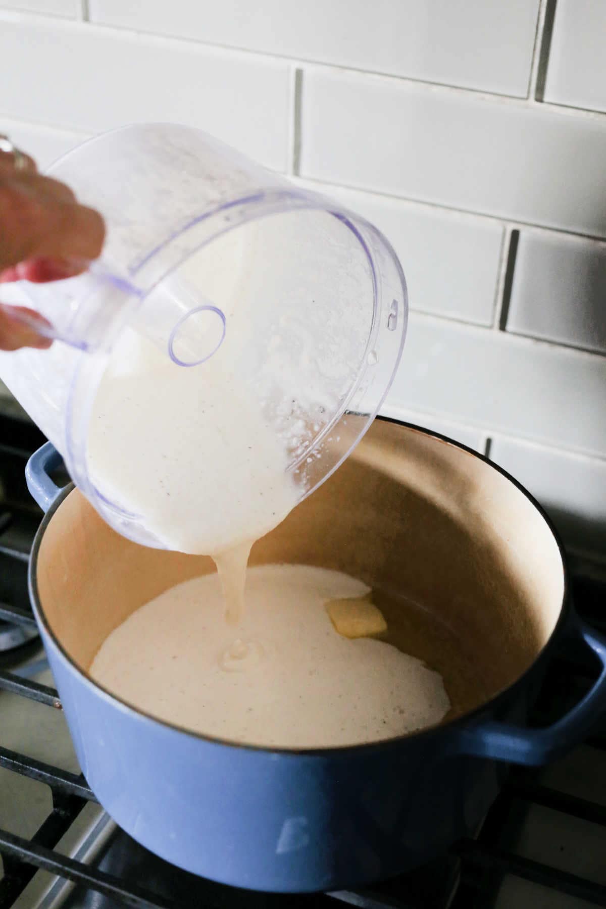 Pouring cottage cheese sauce in pot.
