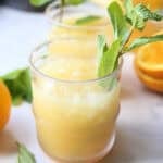 Cup of orange juice and electrolytes to make a cortisol cocktail recipe.