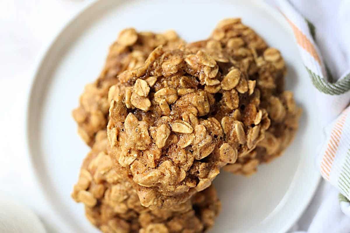 Best soft peanut butter oatmeal cookies baked and stacked on a plate.