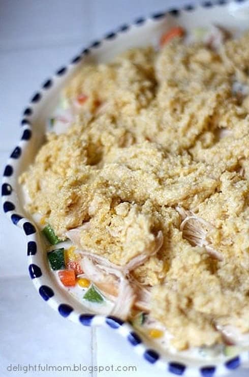 Cornbread batter spooned over the pot pie filling before baking.